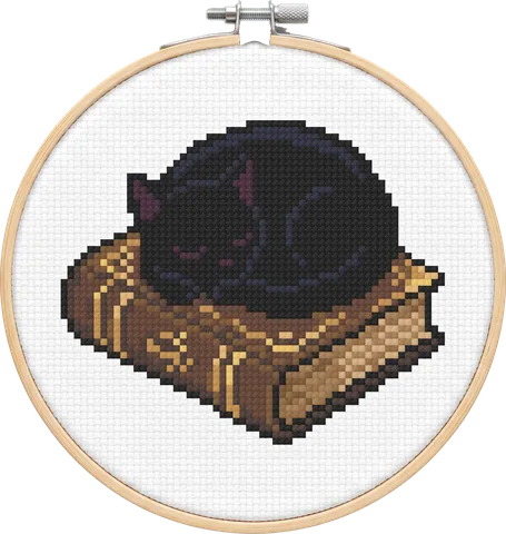 Book Cat cross-stitch pattern, stitched in a hoop