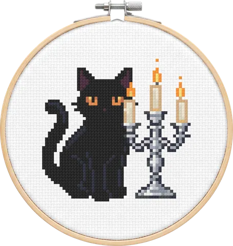 Candle Cat cross-stitch pattern, stitched in a hoop