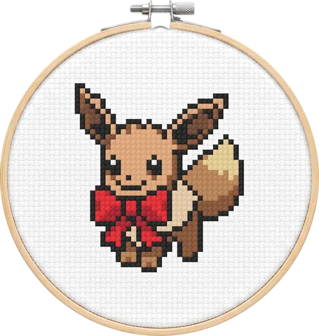 Christmas Eevee cross-stitch pattern, stitched in a hoop