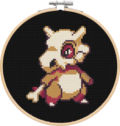 Cubone cross-stitch pattern, stitched in a hoop