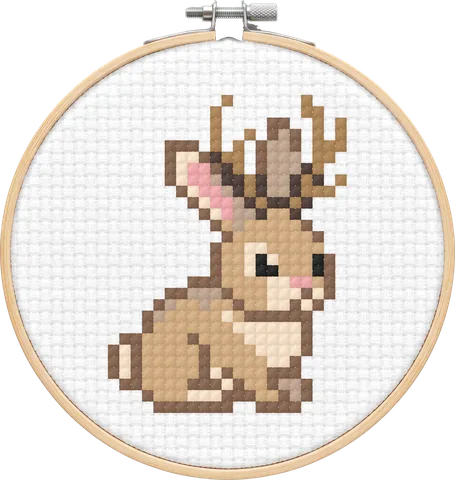 Jackalope cross-stitch pattern, stitched in a hoop
