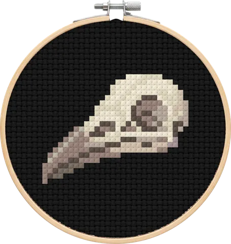 Raven Skull cross-stitch pattern, stitched in a hoop