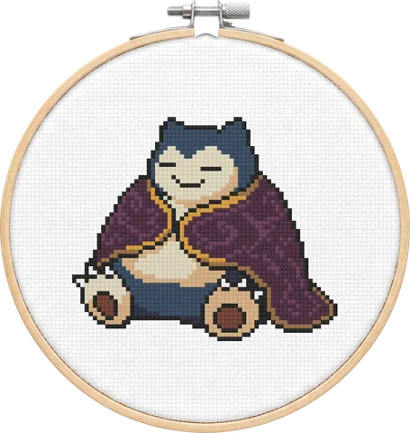 Vampire Snorlax cross-stitch pattern, stitched in a hoop